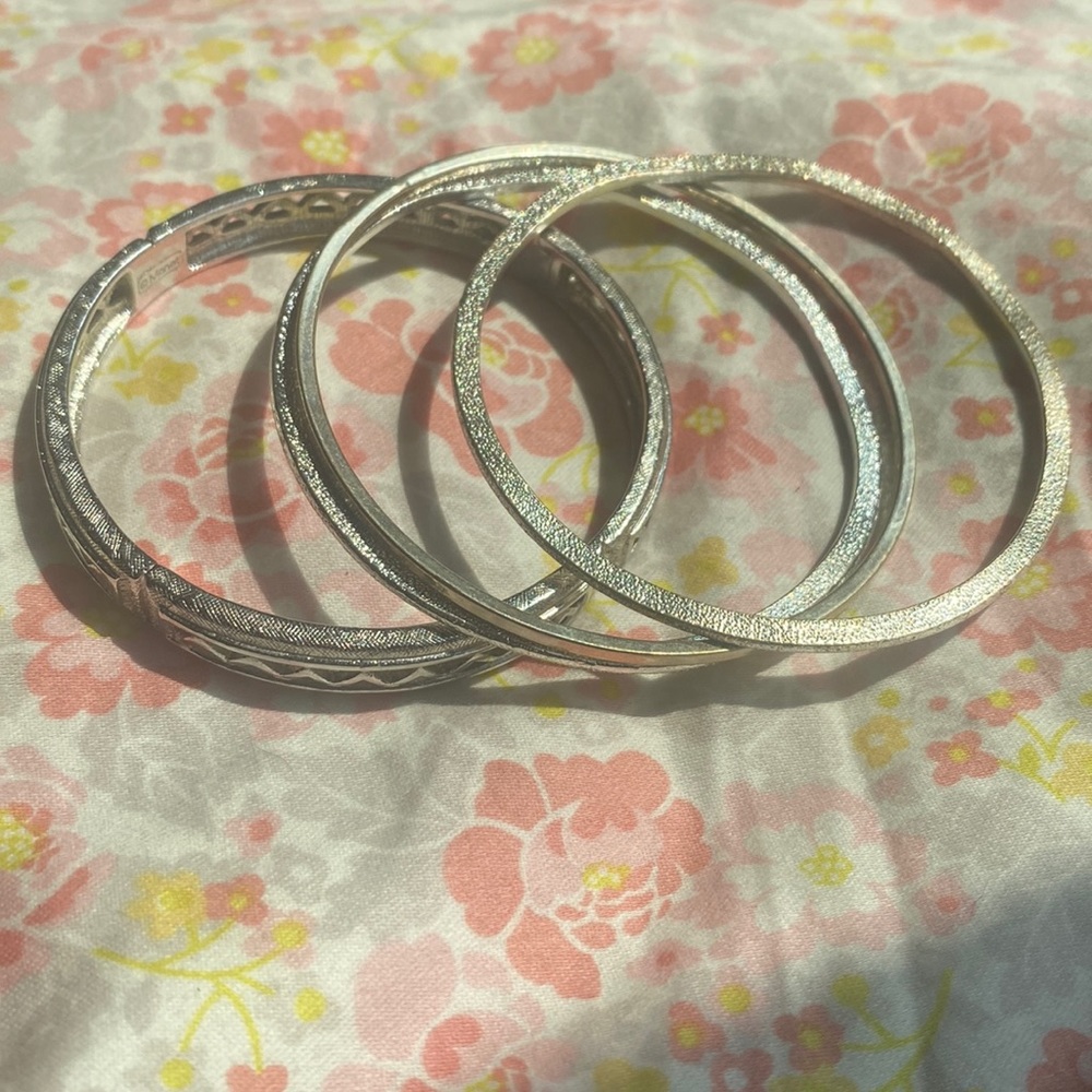 4 silver bracelets